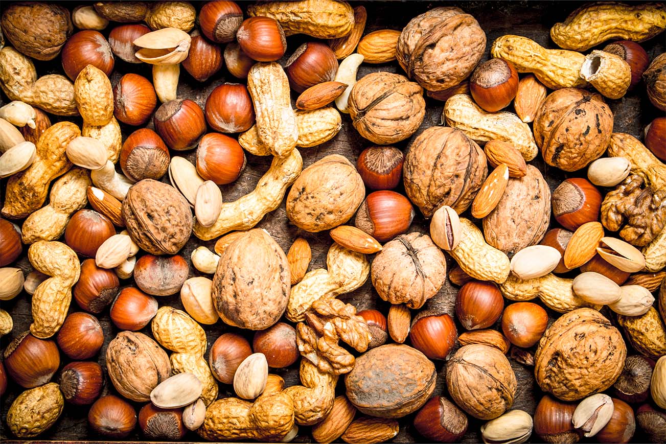 Composition of various kinds of legumes on black background