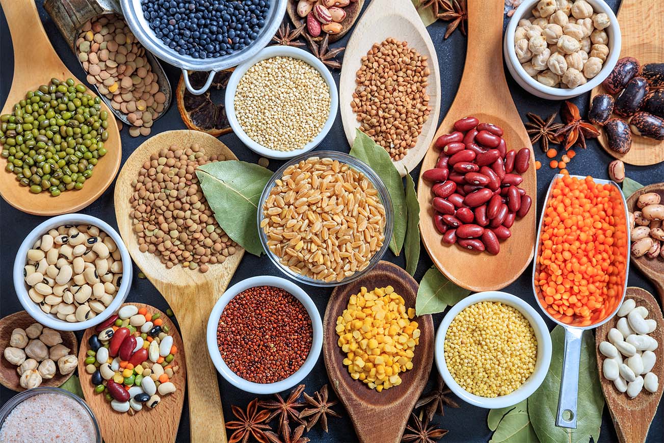Composition of various kinds of legumes on black background